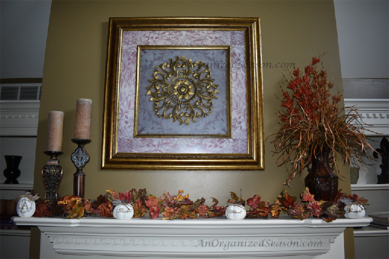 Mantle decorated and organized for the Fall.