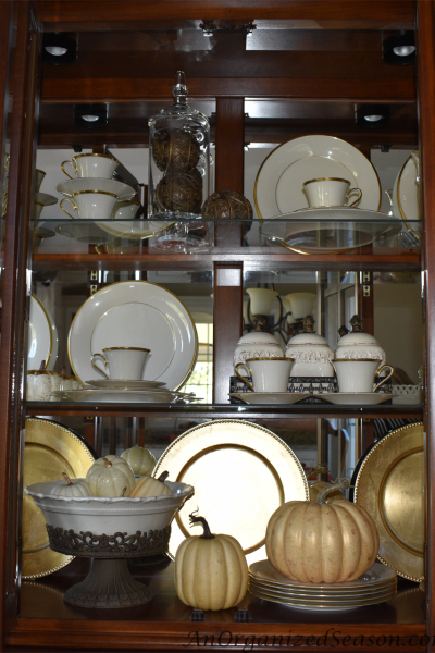 China cabinet decorated for Fall