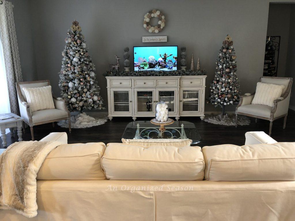 The living room decorated for Christmas.