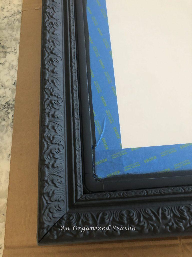 Frame with 2 coats of Behr Classic Noir chalk paint
