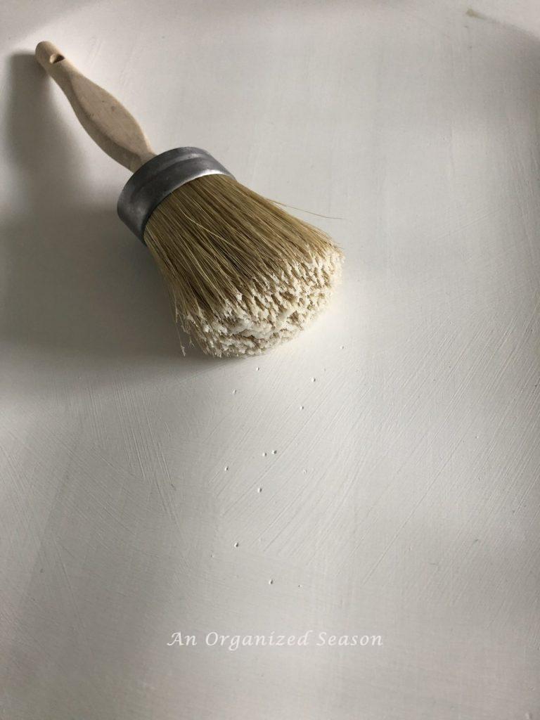 A brush with clear wax on it. 