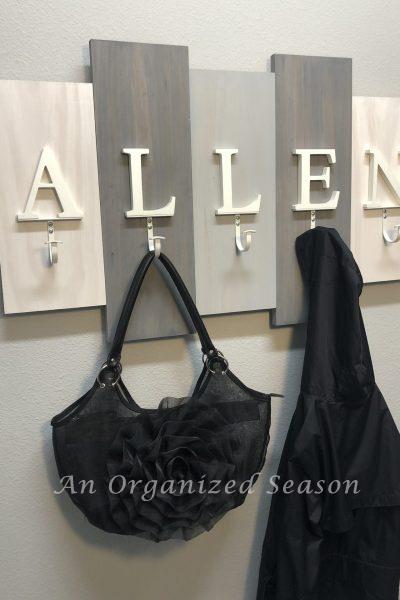 Learn How to Make a Personalized Coat Rack at AnOrganizedSeason.com
