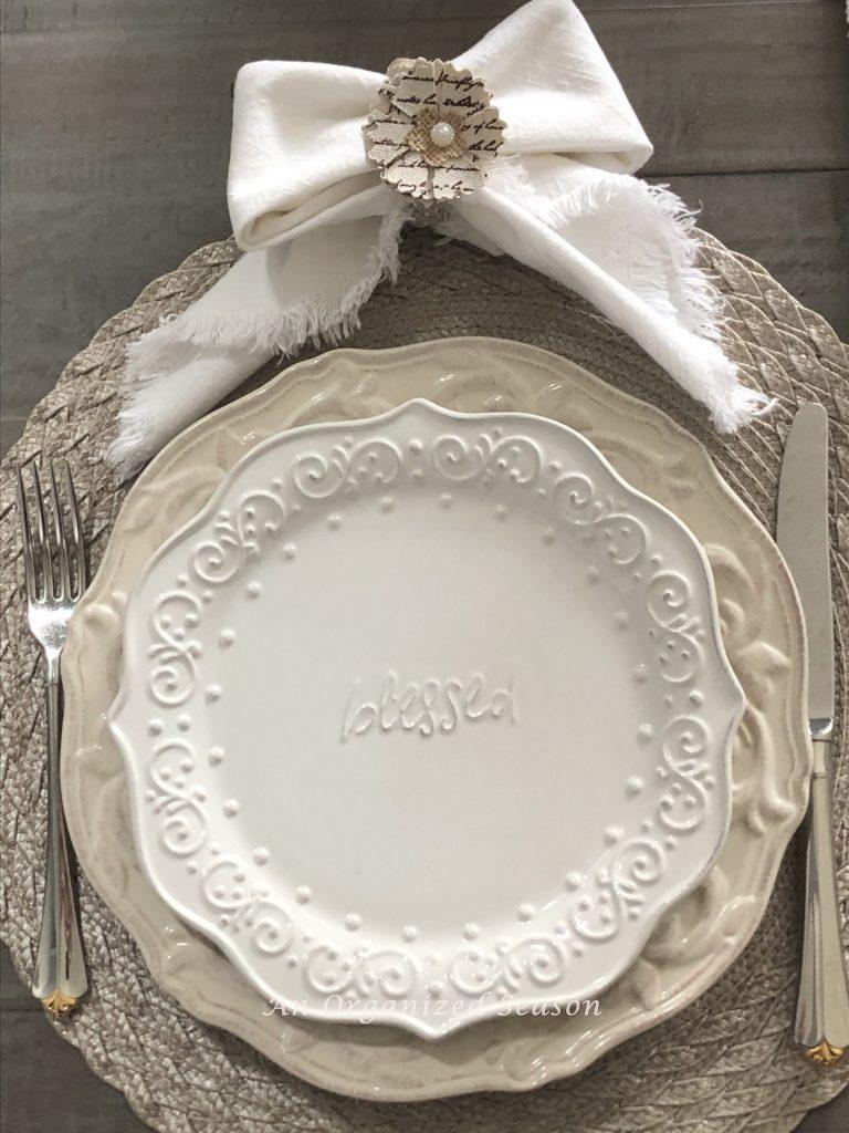 White roses surrounding the base of a cake plate