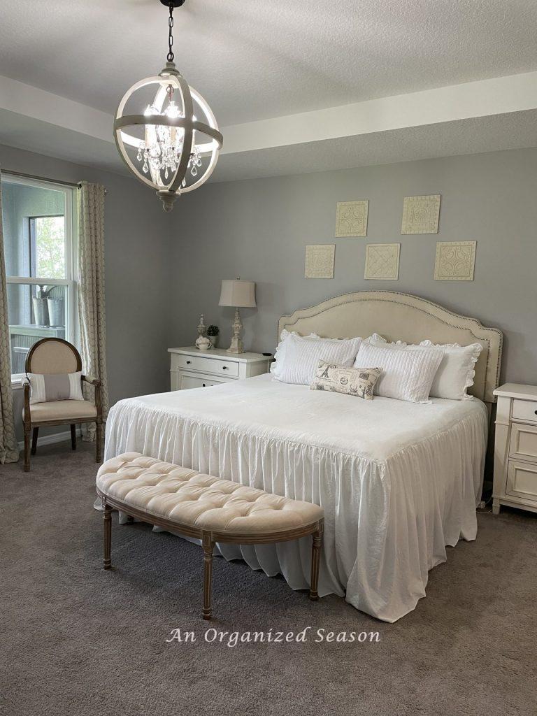 Proper lighting is important to a French country inspired bedroom makeover.