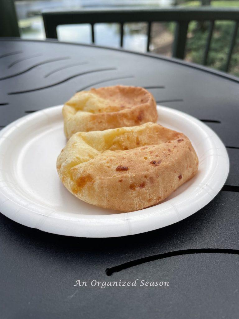 Two pieces of Brazilian Cheese bread a yummy treat at the EPCOT Food and Wine Festival.