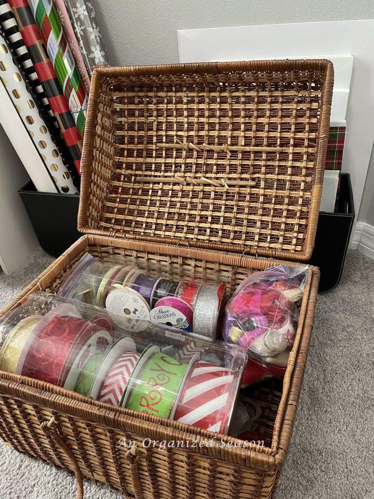 Ribbon used for gift wrapping being stored in a lidded basket. 