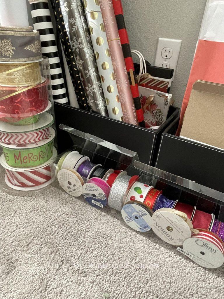 Ribbon stored in plastic containers so you can see it. 