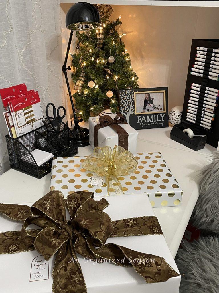 Gifts laying on a gift wrapping station.