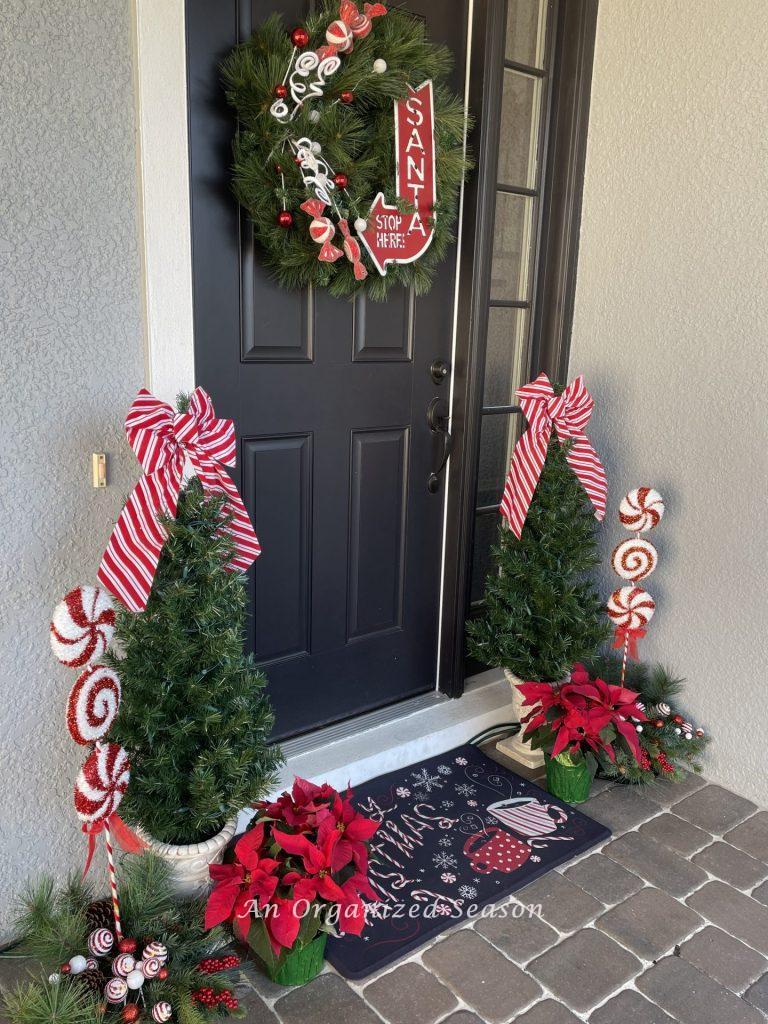 Red and white holiday porch decor. 