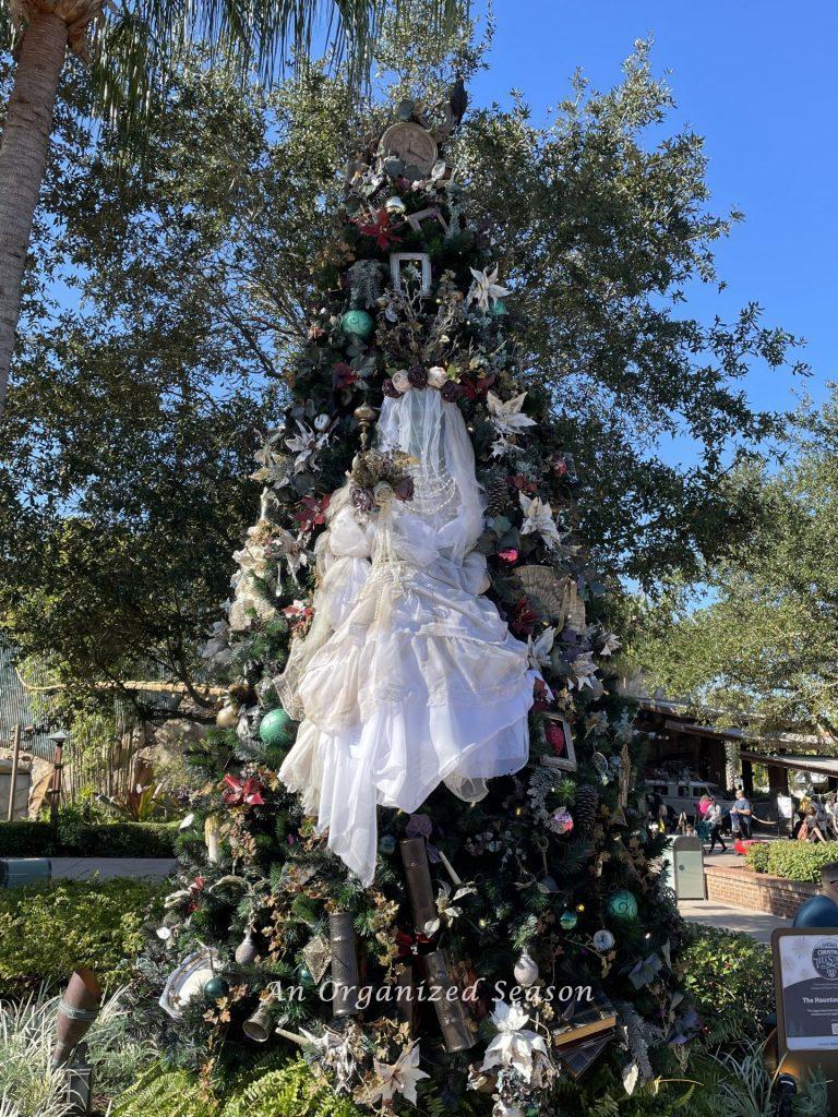 A haunted mansion themed tree on the 2021 Christmas tree stroll.