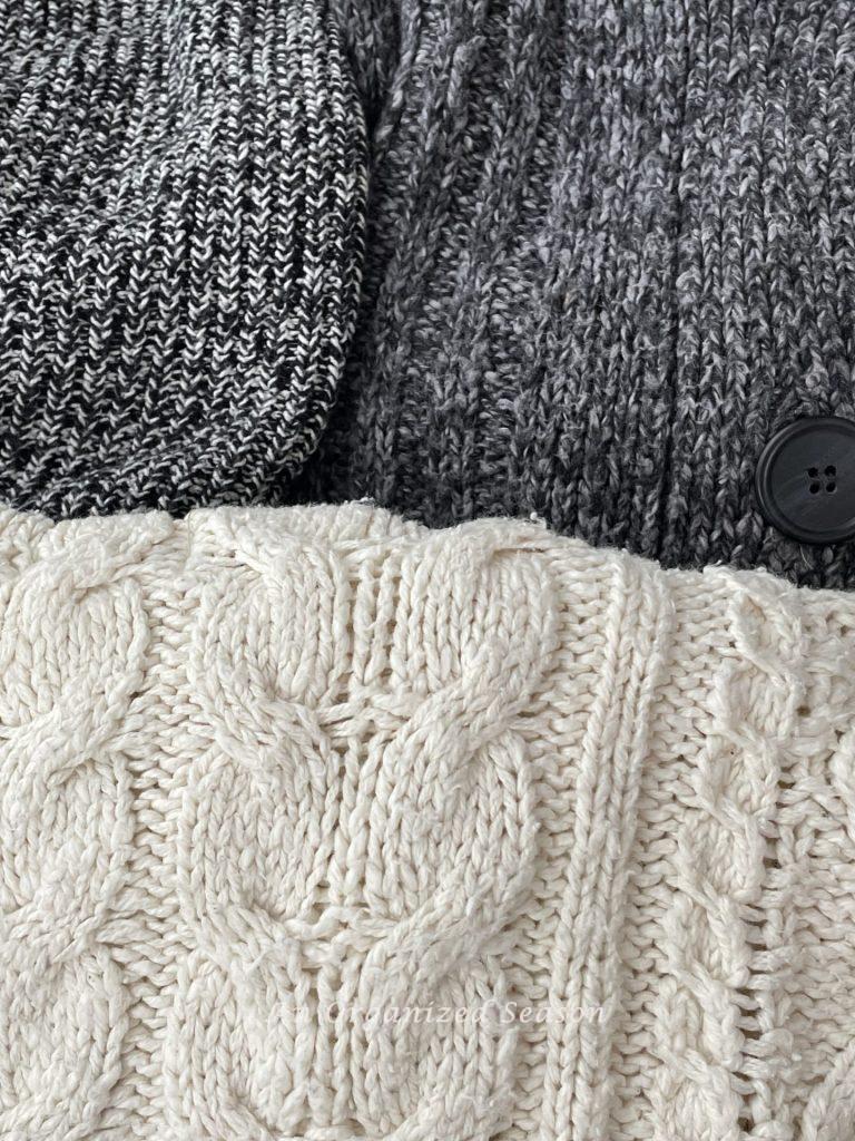 Three sweaters used to make a winter wreath. 
