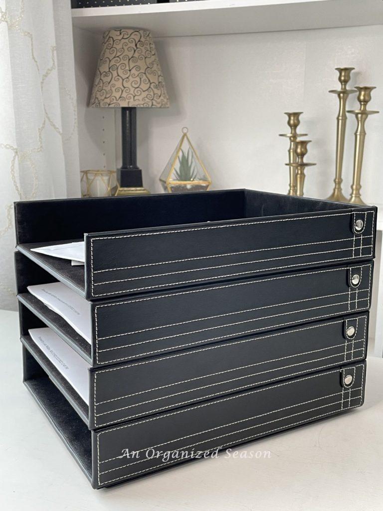 Four stackable paper trays to keep you organized and help get rid of paper clutter.