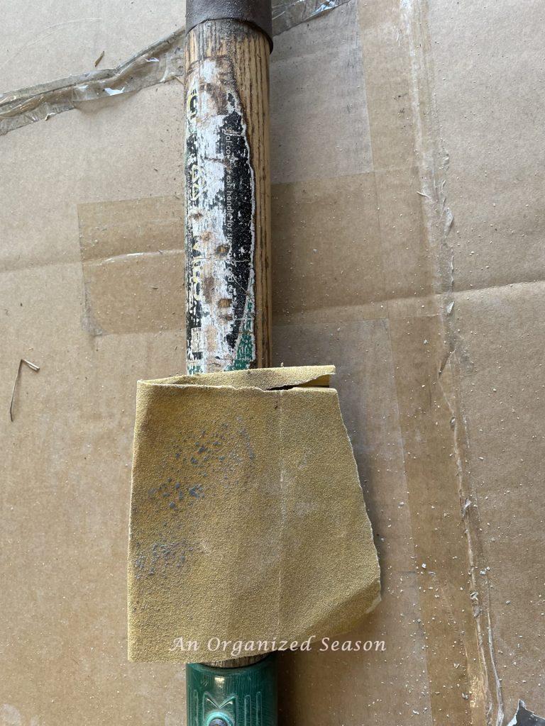 Remove stickers from handles is step two to learn how to maintain and organize your yard tools.