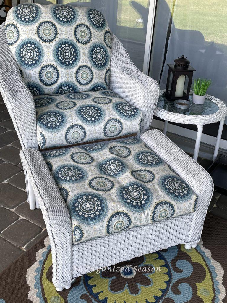 There are15 items you need to create a relaxing porch, a chair and ottoman are number two.