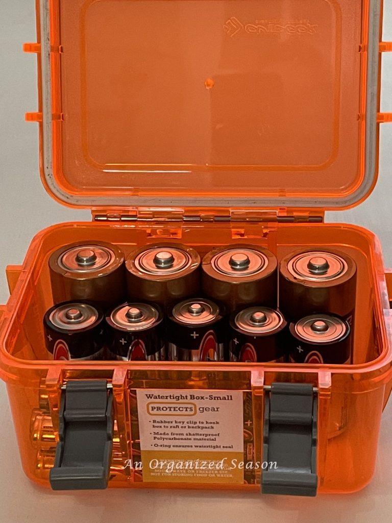 Batteries in a waterproof box showing how to be prepared for an emergency!