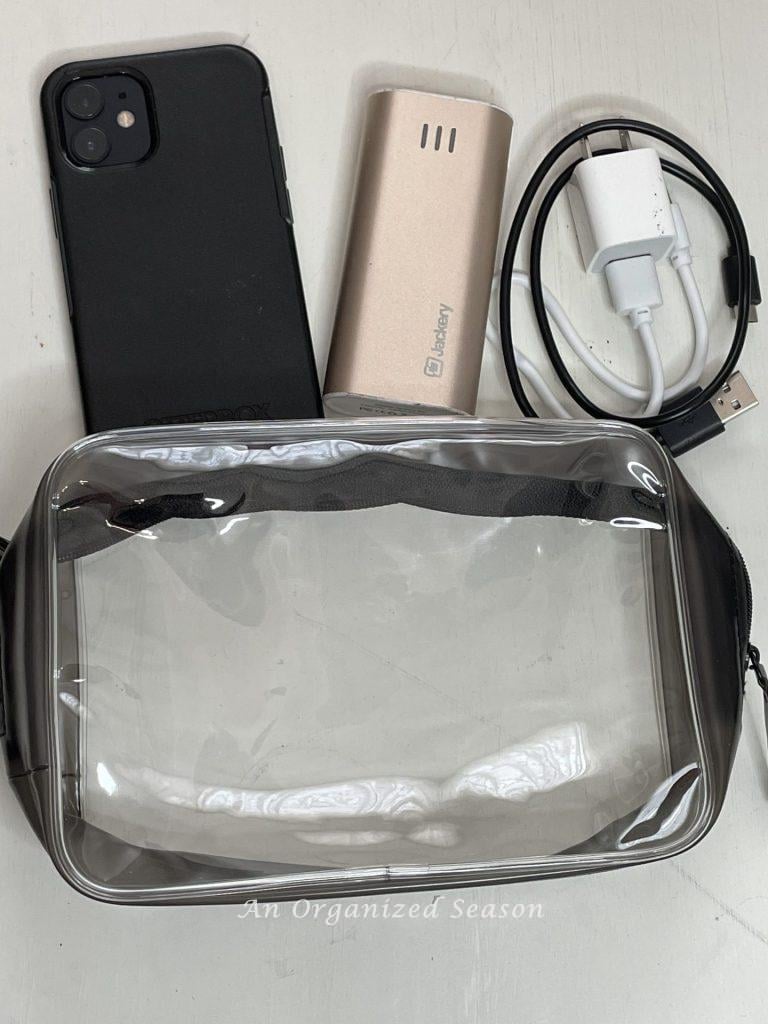 Waterproof bag, phone, charger, and cords are suggestions on the amusement park ultimate packing list.