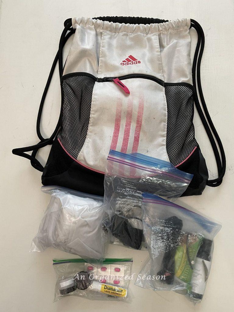 A string bag and Ziploc bags suggested in the amusement park ultimate packing list.