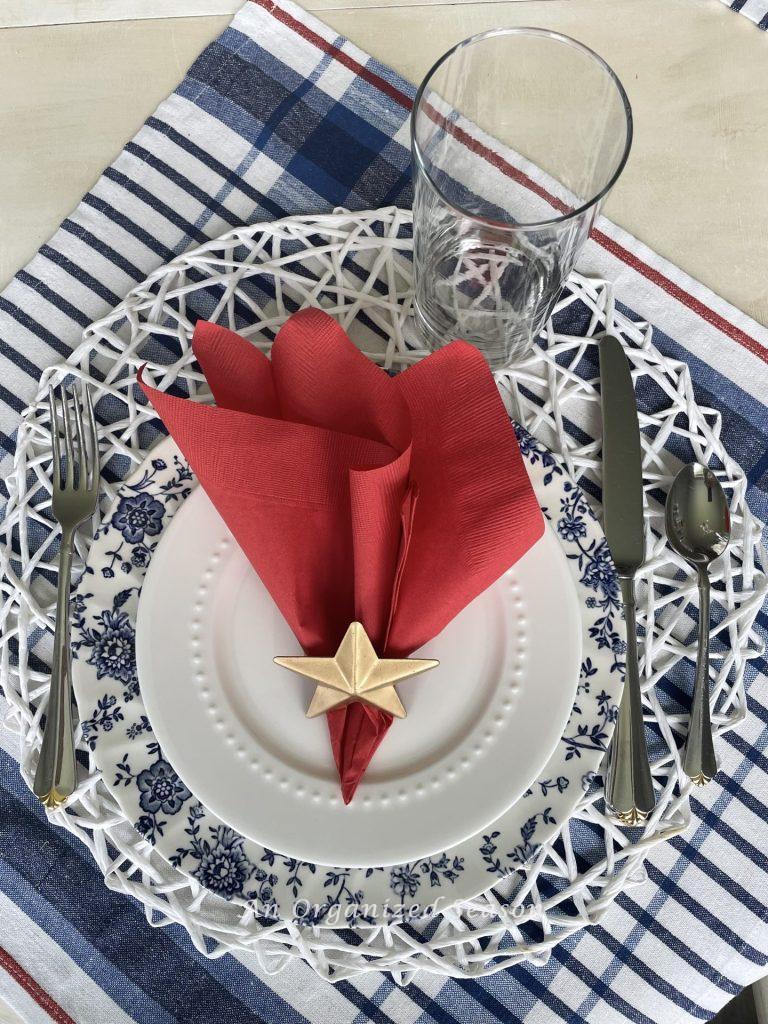 Use a weaved placemat to add texture, number 4 for tips to set a patriotic table.