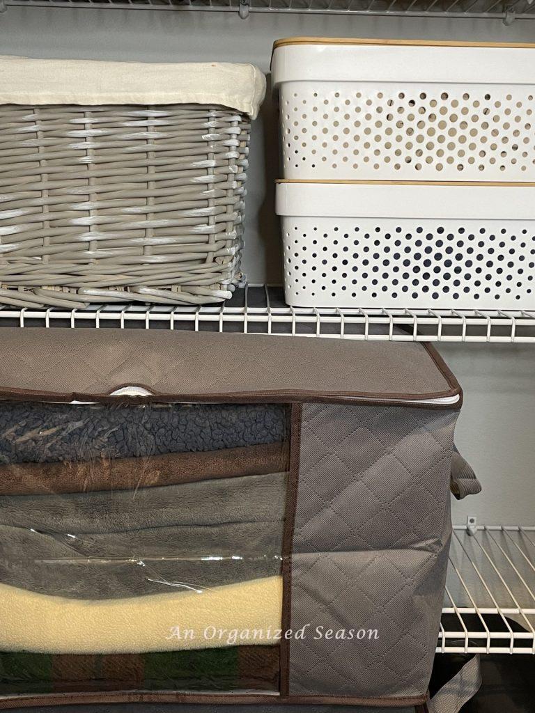  My best advice for organizing a linen closet is to use containers! 