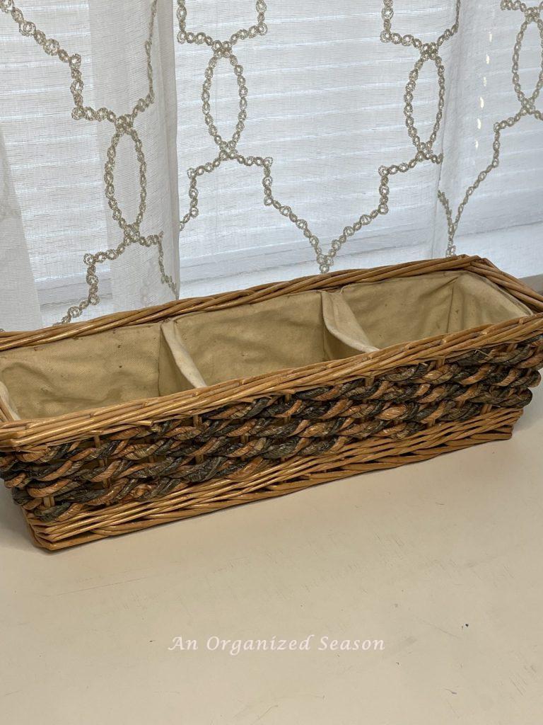 A neglected and dirty basket perfect for a makeover with paint!