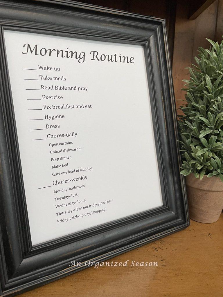 A black frame with a morning routine schedule inside. 