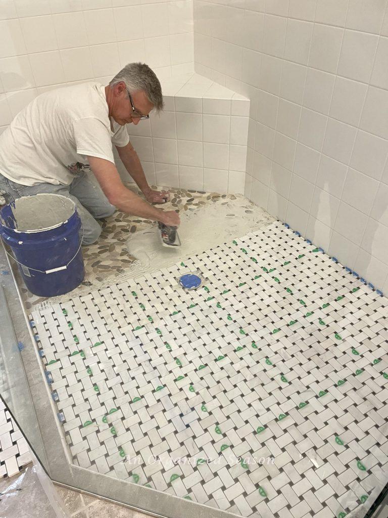 Use spacers when you tile over the existing tile.