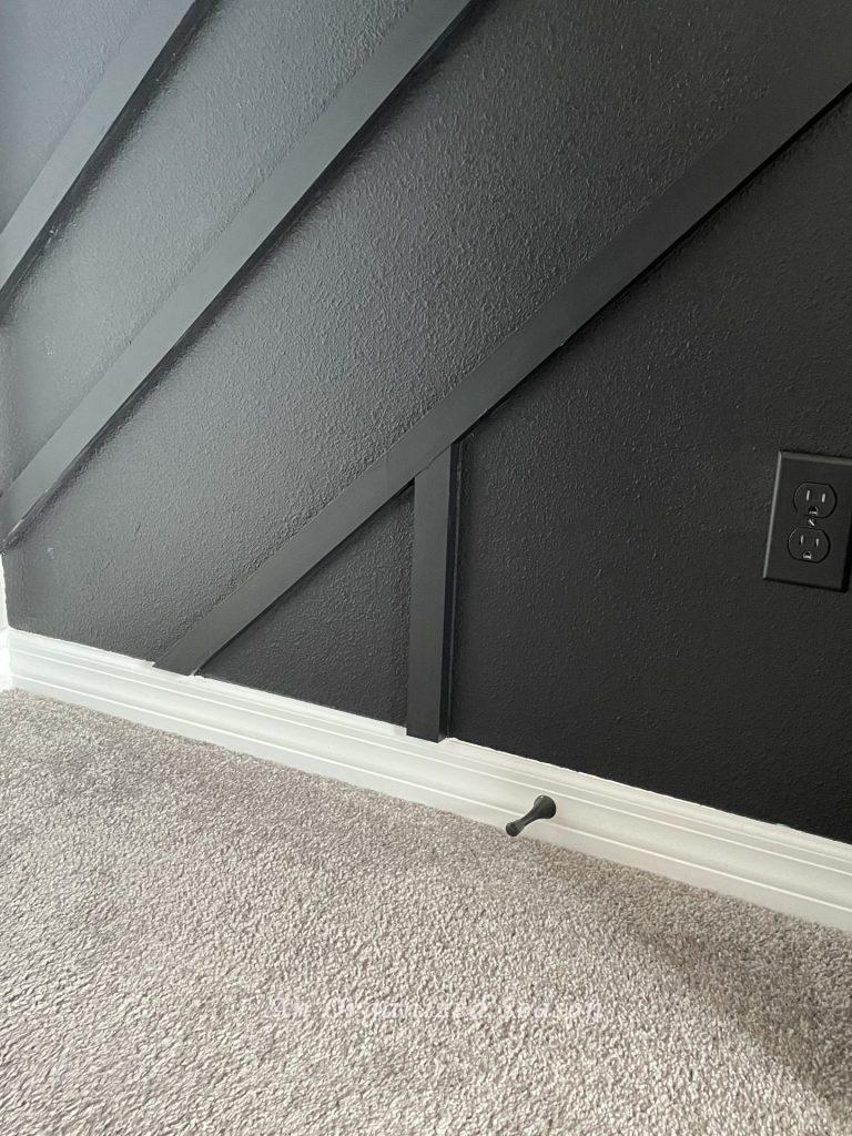 Gray carpet used in  boring bedroom makeover for a gamer.