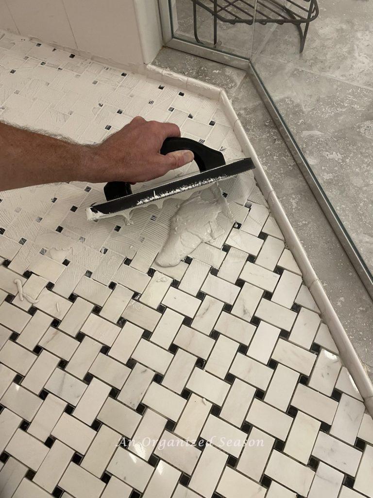Apply grout when you tile over the existing tile.