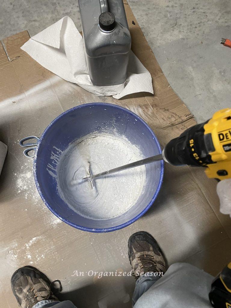 Mix the mortar before you tile over the existing tile.