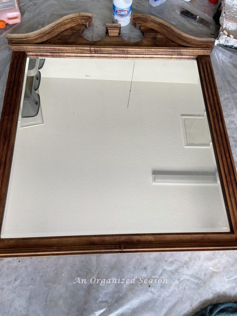A mirror after being cleaned with odorless mineral spirits. 