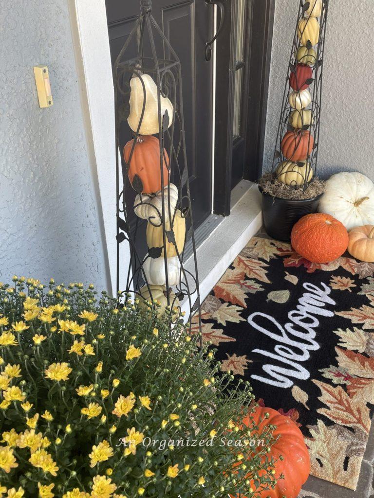 A front door rug that says welcome. 