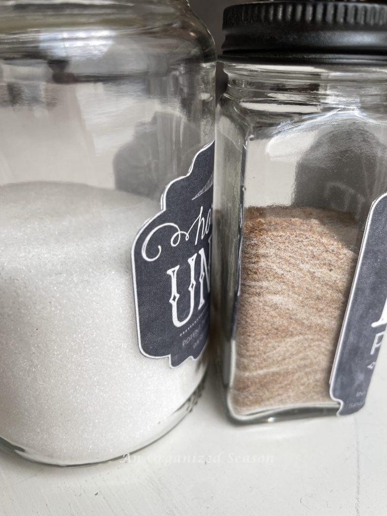 White sugar and coconut sugar inside spooky potion bottles from jars!