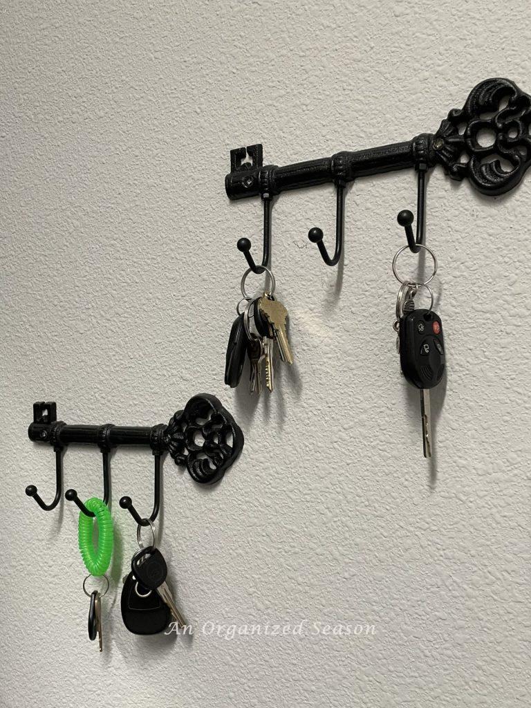 Key holders hanging on a wall are an idea to create an organized entryway!