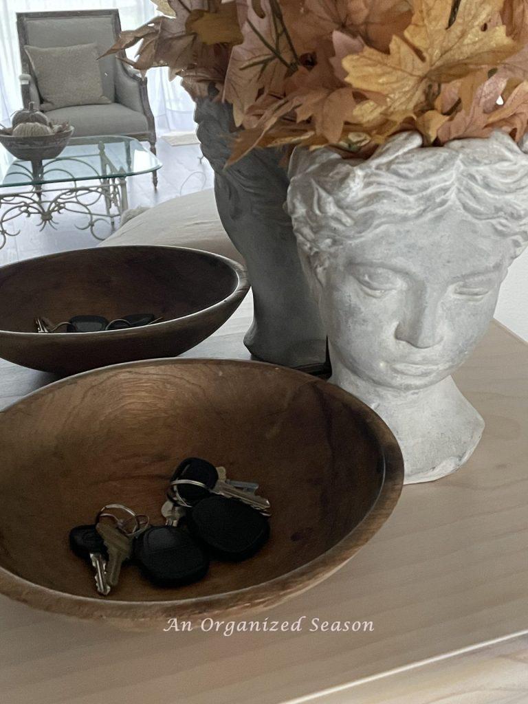 Placing keys in a bowl is an idea to create an organized entryway! 