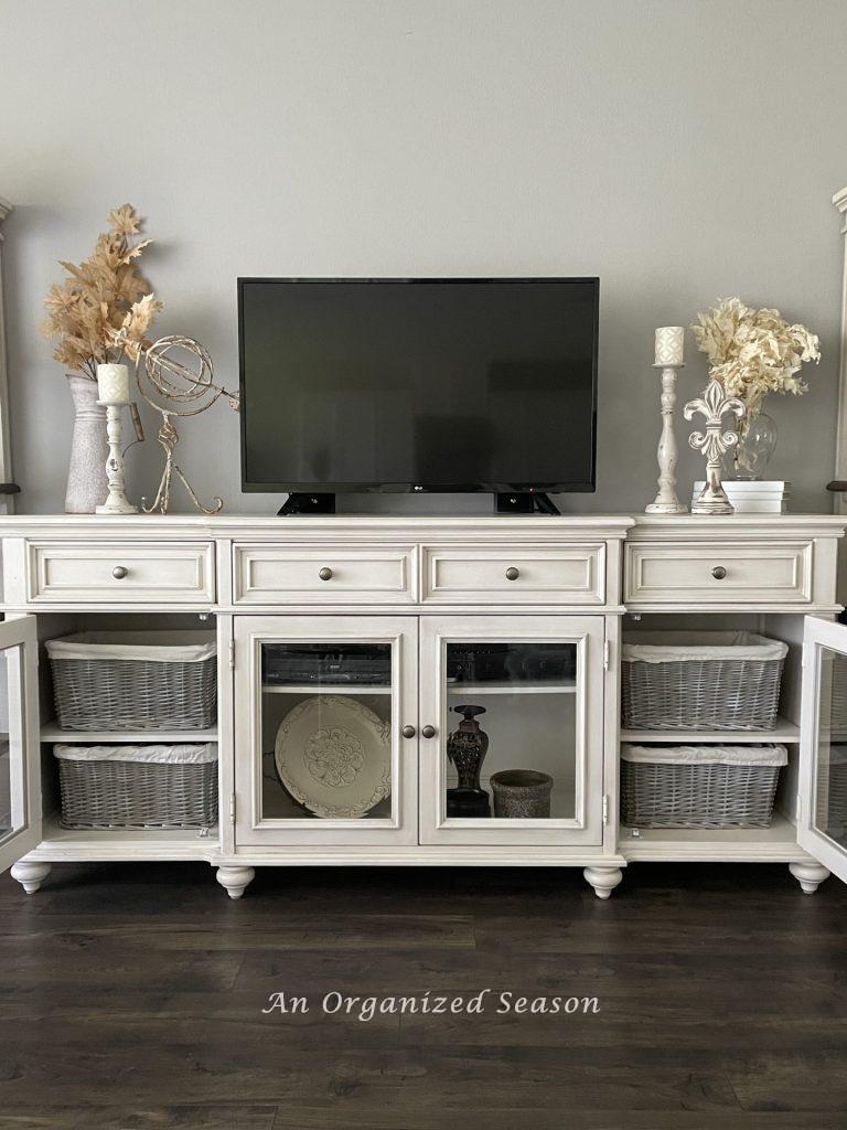 A TV console that was organized during the Fall Home Organization & Improvement Challenge. 
