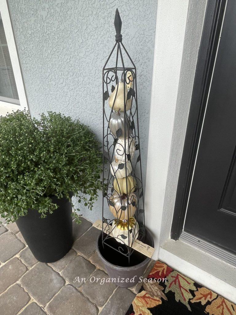 Decide how to place each pumpkin inside the obelisks.