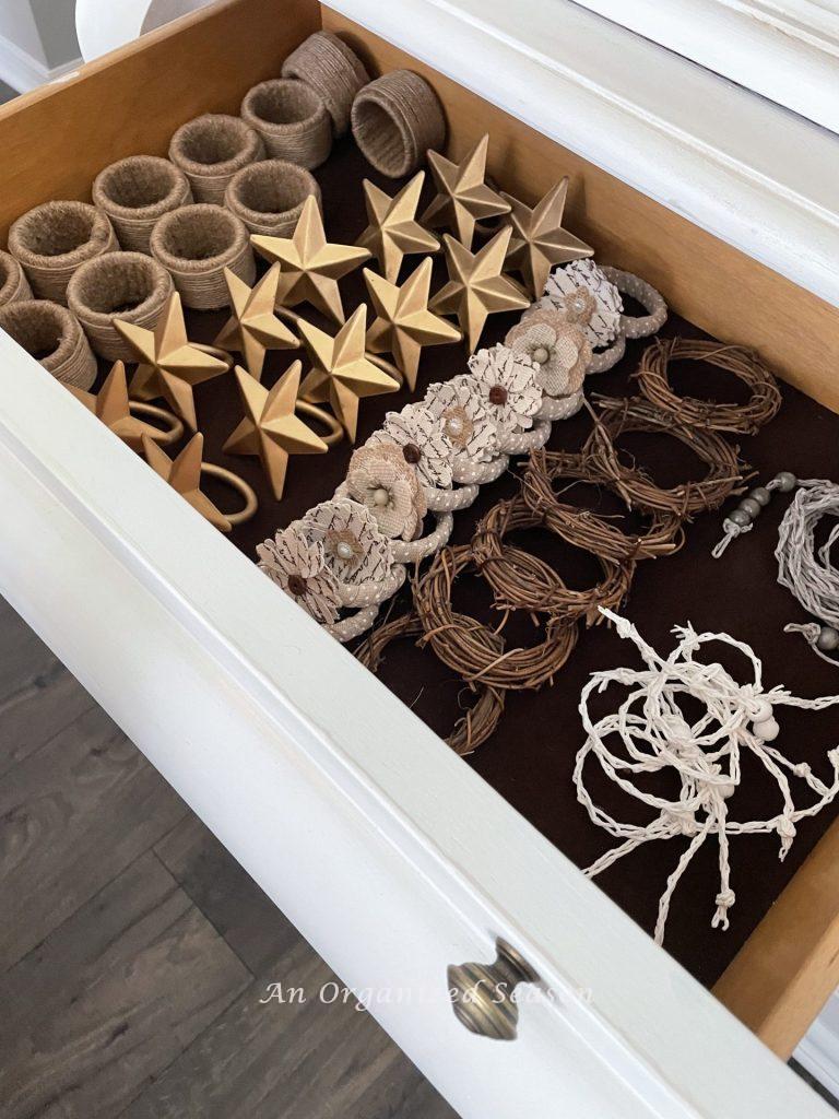 Declutter the dining room and store napkin rings in a china cabinet drawer! 