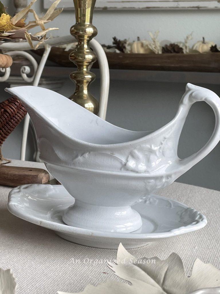 Using an antique gravy boat, great ideas for a thrifted Thanksgiving table.