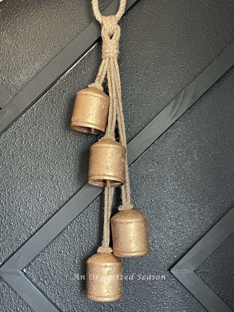 White bells painted gold to create a Pottery Barn rustic iron bell hack.