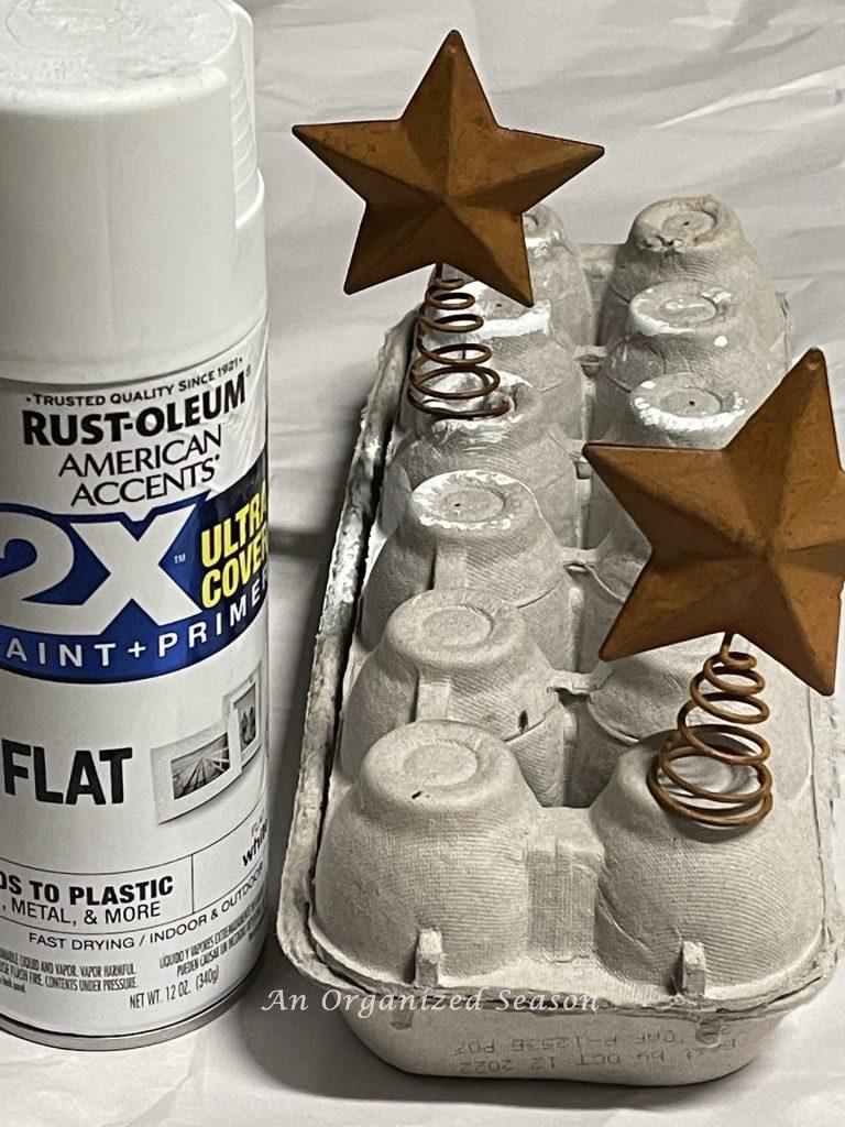 Brown star tree toppers that will be painted to use on a DIY cone Christmas tree.