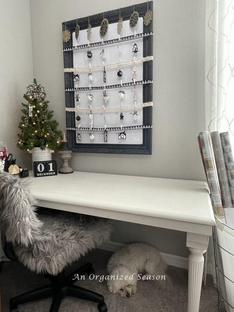 A white desk set up as a gift-wrapping station showing tips to make your life easier. 