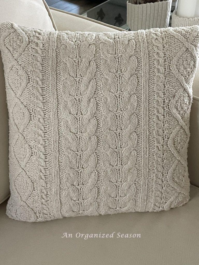 A pillow made out of an old sweater. 