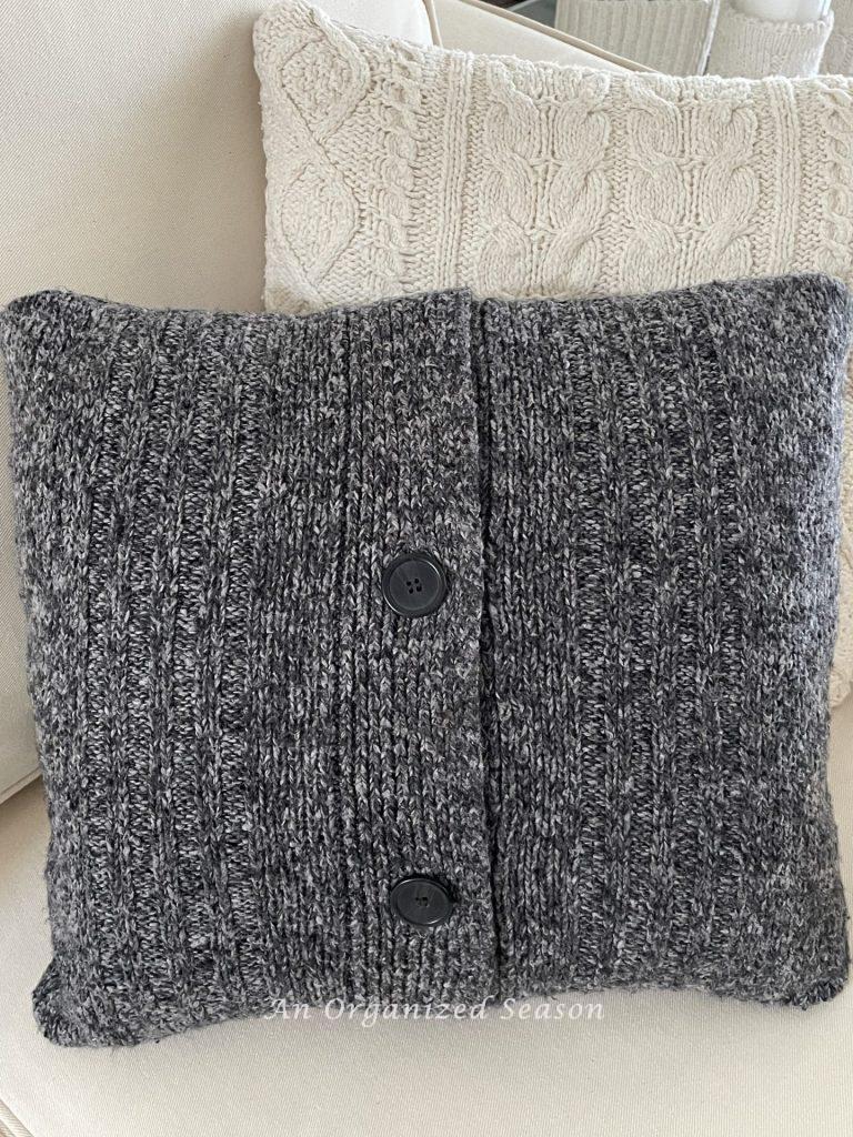 Two throw pillows made from old sweaters. 
