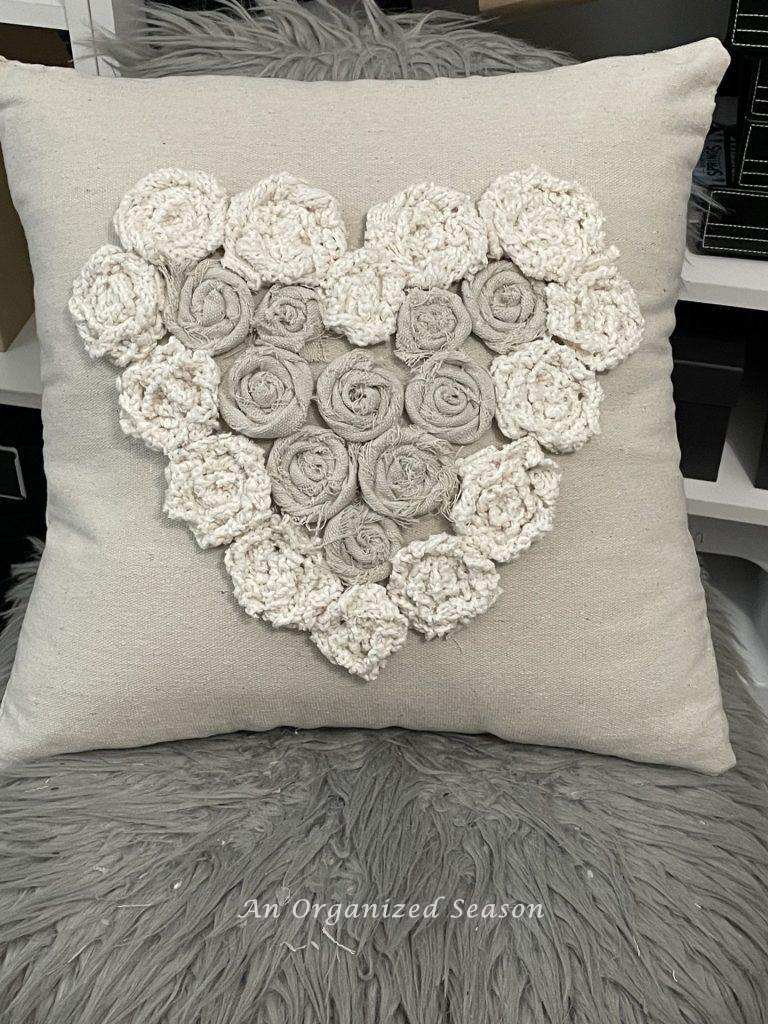 A valentines pillow created from rosettes made with sweater scarps and drop cloth pieces! 