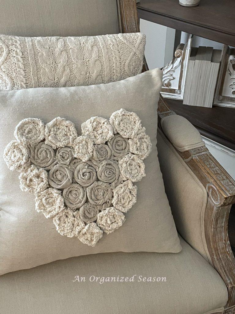 A valentines pillow created from rosettes made with sweater scarps and drop cloth pieces! 