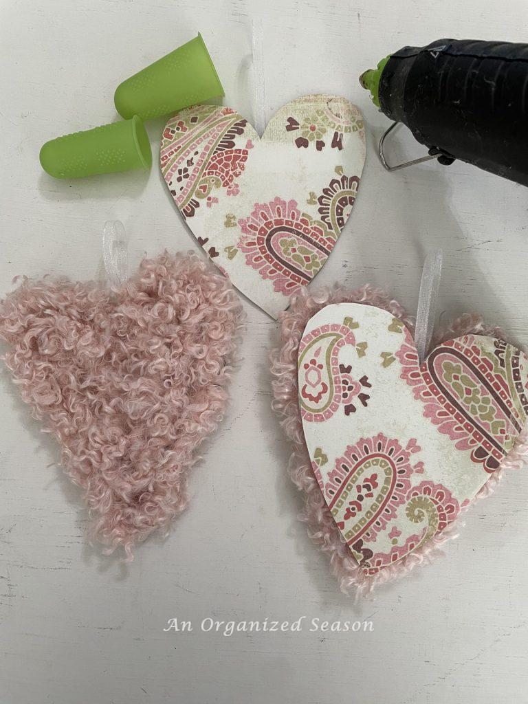 Cute hearts, made with paper and yarn for Valentine's decor.