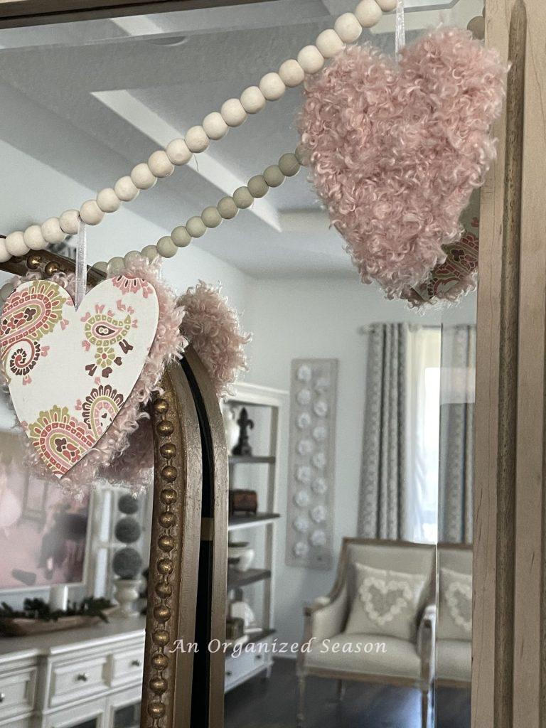 A wood bead garland with cute Valentine's hearts. 