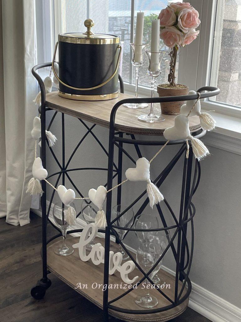 A bar cart decorated for Galentine's Day!