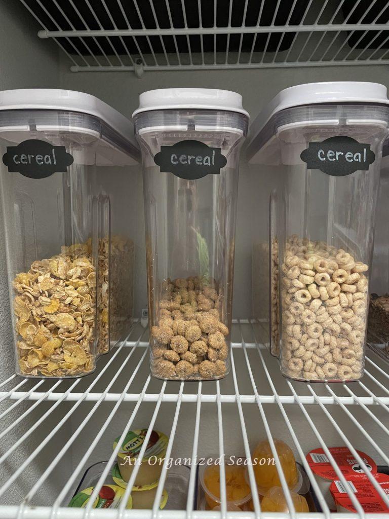 Three Oxo containers storing cereal in a pantry I love!