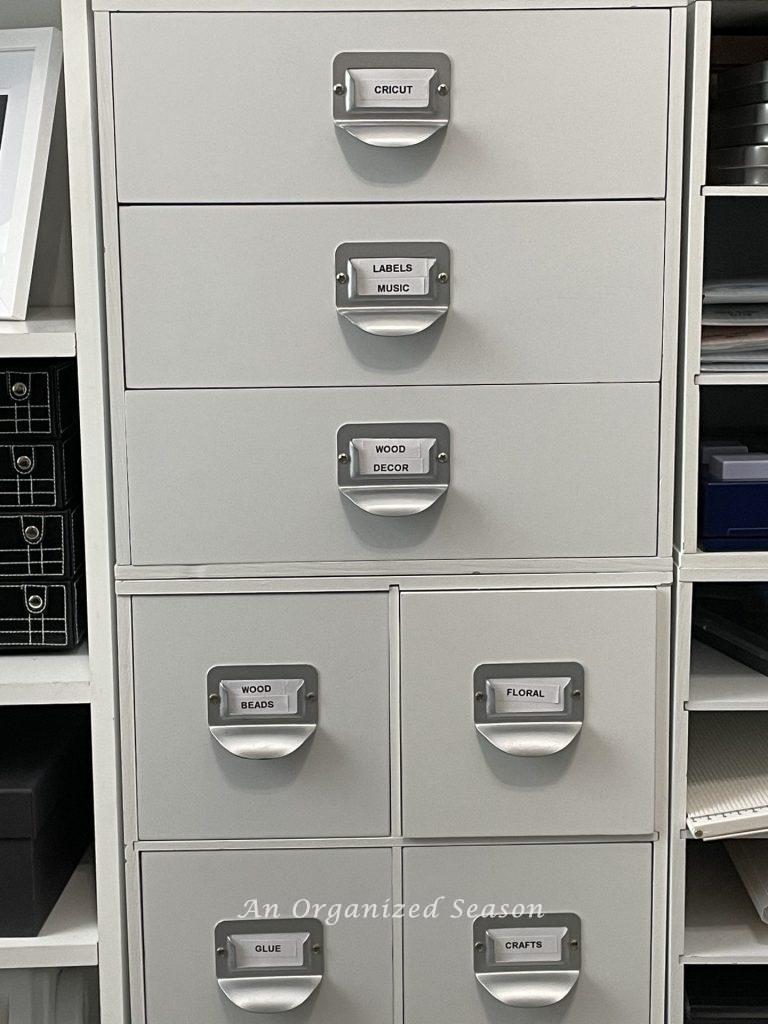 White storage cubbies with labels.